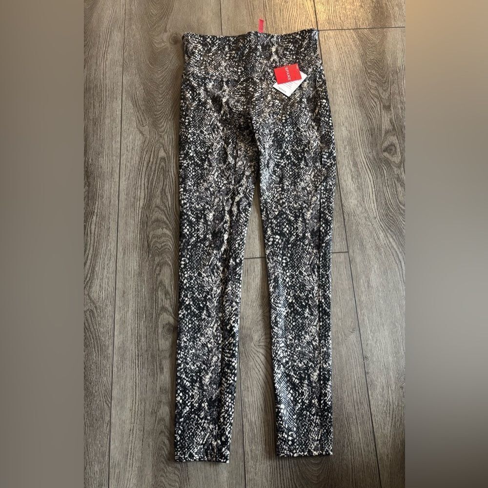 Spanx woman’s snake print leggings